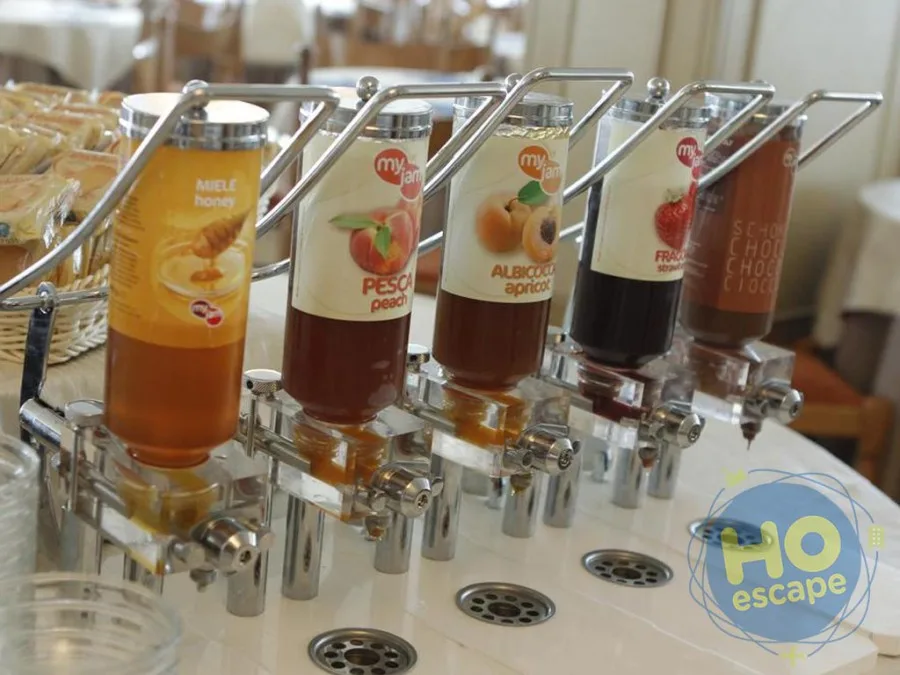 Dispenser di marmellate, miele e cioccolata per la colazione a buffet