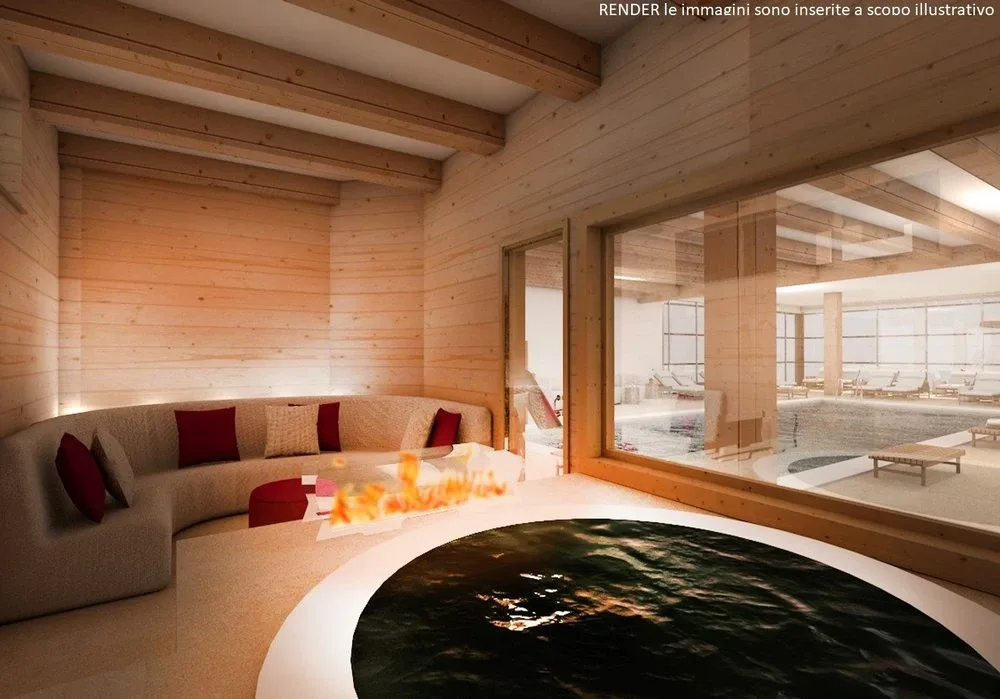 Render di area relax della spa con divano e vista sulla piscina interna